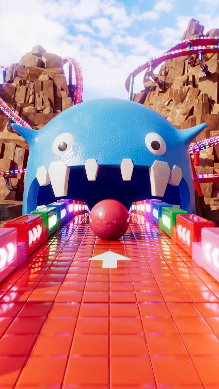 青いモンスターの口と赤いボール